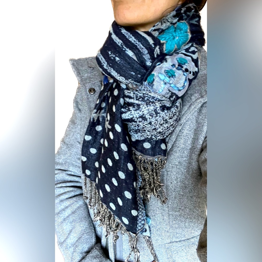 Scarf from WORLD MARKET. 70x22”. 2” tassels on each end.